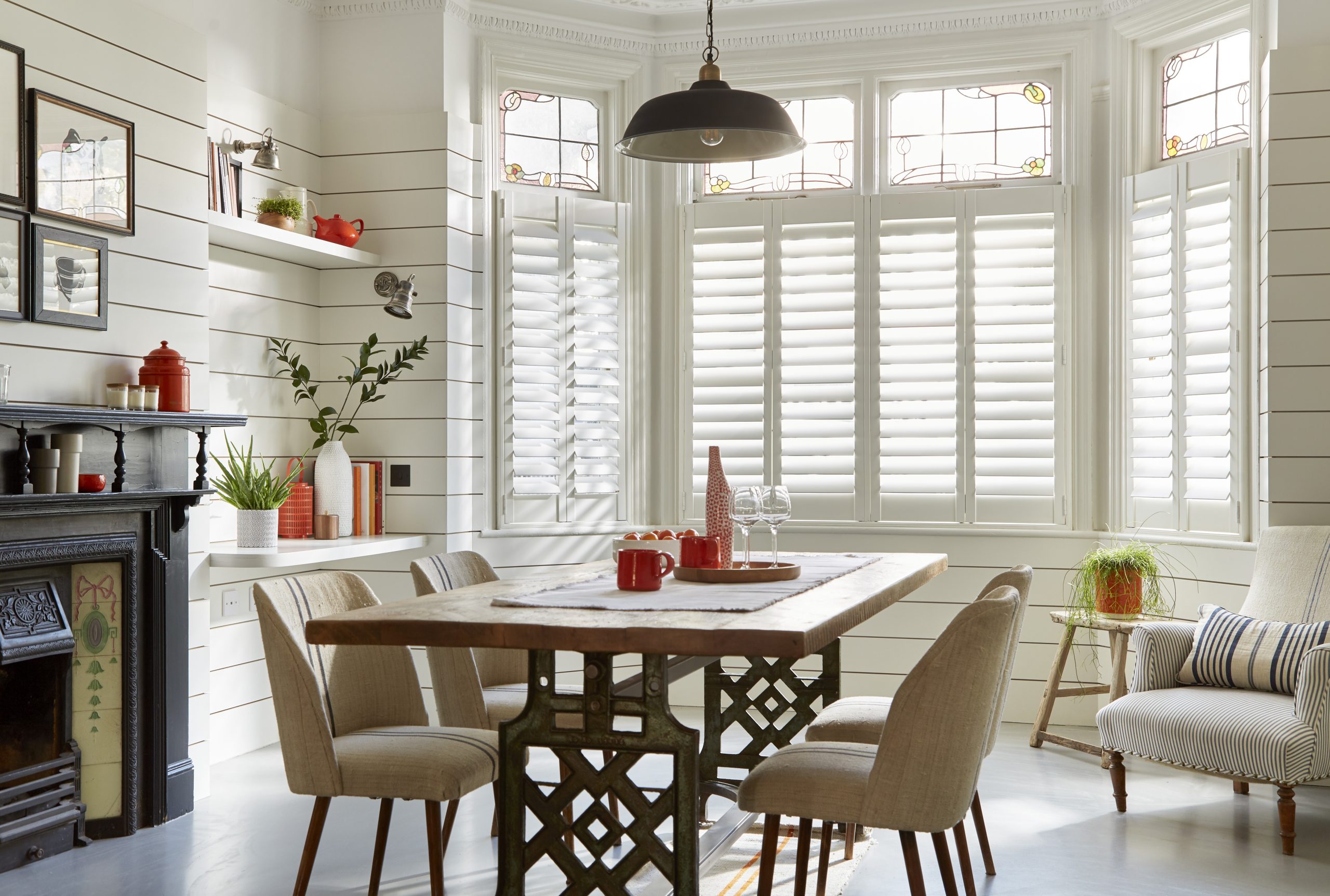Bay shutters with armchair